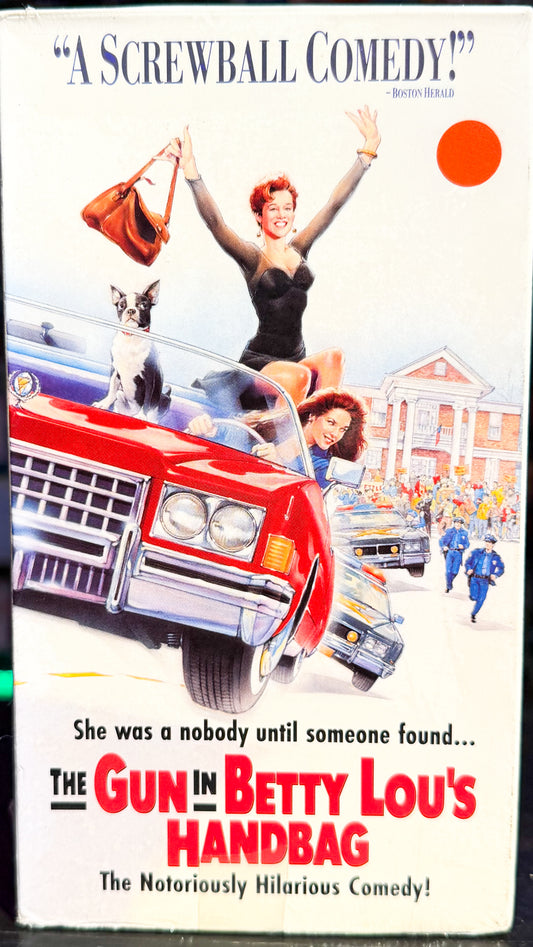 The Gun In Betty Lou’s Handbag